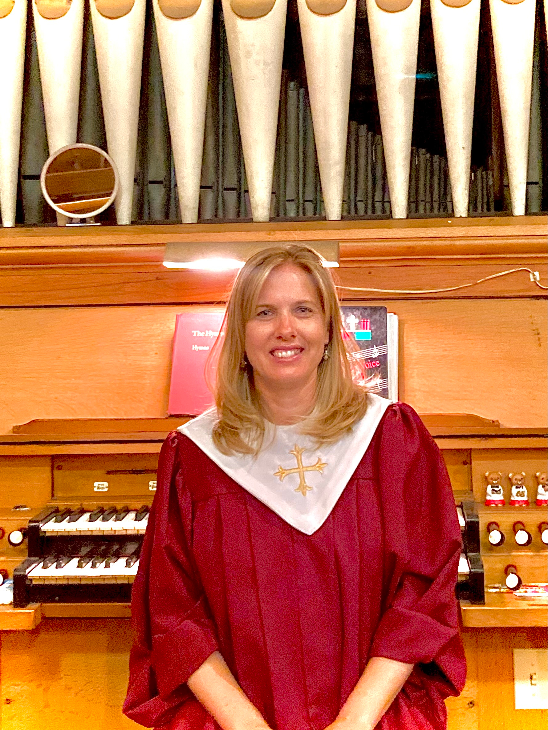 Church organist Jen Fisicaro with the Good Shepherd Pipe Organ.